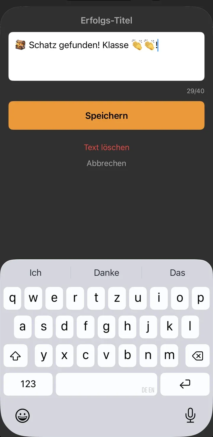 Dialog „Erfolgs-Titel“ mit dem Text „Schatz gefunden! Klasse 👏👏!“