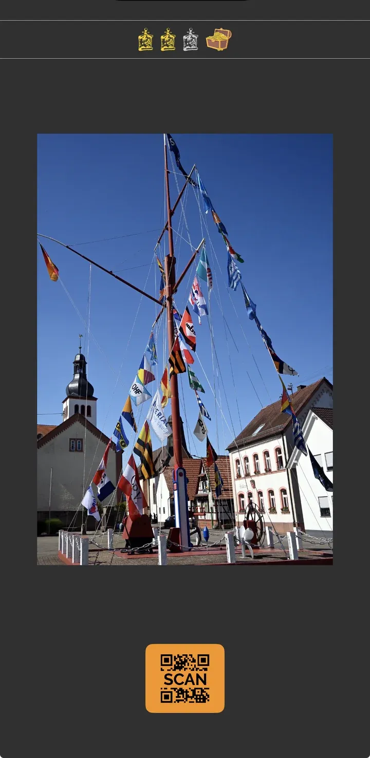 Suchbild im Spiel mit orangem Scan-Button darunter